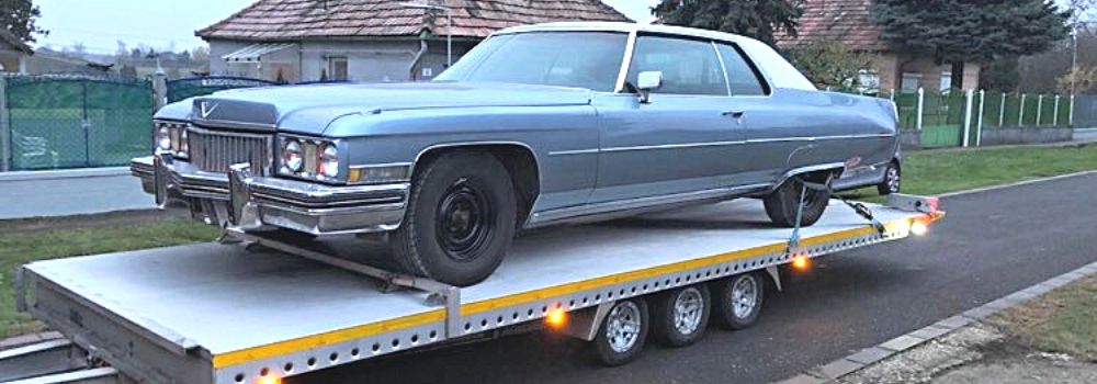 Cadillac Deville Coupe traileres szállítása